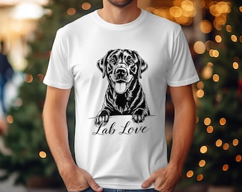 May include: White t-shirt featuring a black and white illustration of a Labrador Retriever dog with the text "Lab Love" below. The dog is depicted with its paws resting on the text.