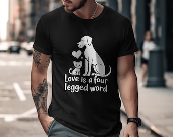 May include: Black t-shirt featuring a white graphic of a dog and cat with a heart, and the text "Love is a four legged word." The design is simple and clean, perfect for pet lovers.