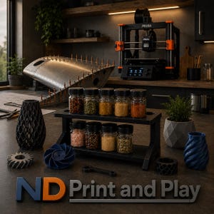 May include: A two-tiered black spice rack holding ten glass jars filled with various colorful spices, surrounded by 3D printed objects including a black geometric vase, a blue turbine, a gear, and a blue spiral vase, with the text ND Print and Play.