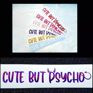 May include: A collection of vinyl stickers with the phrase "CUTE BUT PSYCHO" in various colors. The stickers feature the text in a bold, stylized font with a devil horn and tail graphic. Colors include red, pink, purple, gold, and blue.