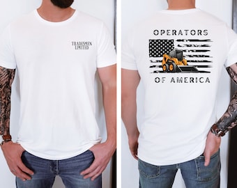 May include: White t-shirt with the text "Tradesmen Limited" on the front and "Operators of America" with a distressed American flag and a yellow construction vehicle on the back.
