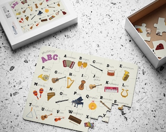 May include: A colorful musical alphabet puzzle with illustrations of musical instruments. Each letter of the alphabet is paired with a musical instrument, such as a guitar, piano, and drums. The puzzle is made of thick cardboard and is perfect for children learning about music.