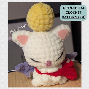 May include: A white crocheted plush toy with a yellow pom-pom on its head, pink inner ears, purple wings, and a red scarf. The plush has closed eyes and a small pink nose. Text on the image reads DPF/DIGITAL CROCHET PATTERN (EN) and IG: AC_Hinapls.