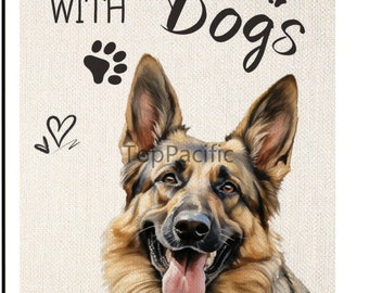 May include: A garden flag with a brown and black German Shepherd dog with its tongue sticking out. The flag has the text "Life is better with Dogs" on it.