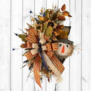 Ghirlanda autunnale spaventapasseri: decorazione rustica per porta in stile fattoria con girasoli