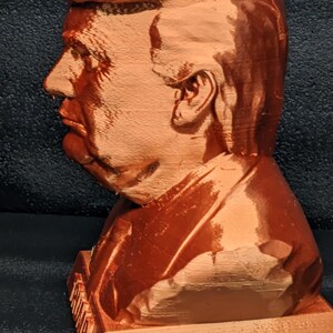 Side view of copper Trump bank