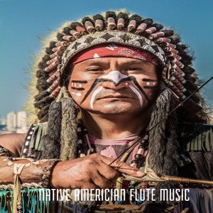 May include: A Native American man wearing a traditional headdress with feathers and beads, holding a flute. He has white paint on his face with black lines. The image has the text "NATIVE AMERICAN FLUTE MUSIC" at the bottom.