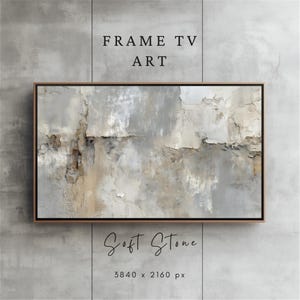 Pode incluir: Uma obra de arte digital emoldurada para Frame TV, apresentando um design abstrato em tons de cinza, bege e branco. A obra é intitulada "Soft Stone" e tem uma resolução de 3840 x 2160 px. O texto "FRAME TV ART" está no topo.