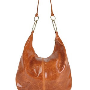 Glänzende Ledertasche