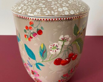 Porcelain sugar bowl with colorful patterns