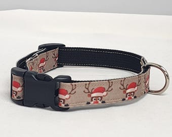 May include: A brown dog collar with a black buckle and a festive reindeer pattern. The collar is made of a soft, durable material and is perfect for small dogs.