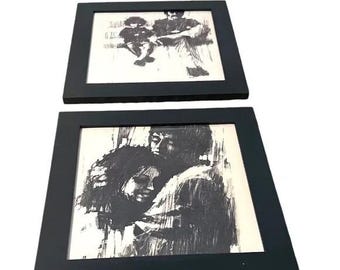 Juego de 2 litografías al carboncillo enmarcadas de Aldo Luongo, pertenecientes a su serie "Amantes".