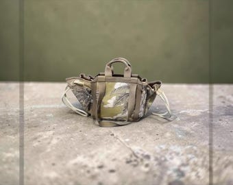 Inoui Editions Robinson design in a beige & light green tropic convertible bag