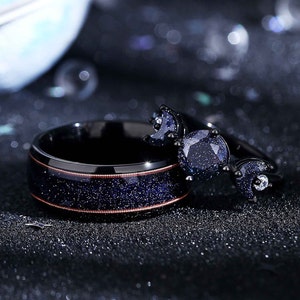 Sol- och månering – Gitarrsträng och förlovningsring med blå sandsten.