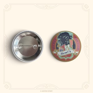 May include: A round button badge with a red, white and blue design. The badge features a silhouette of a person with a crown and the text "Secret Fan Club Howl's 1988".