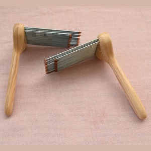 Fine wool combs, spinning diz, leather covers