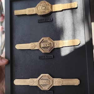 Escultura Tableau 3D Collection Campeón de ceinturas de UFC