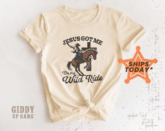 Cowboy Christian T-Shirt: Jesus Got Me On This Wild Ride, Country Western Graphic Tee ( GB2427 )
