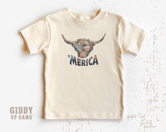 Funny 4th of July Cow T-Shirt, 'Merica Highland Cow Natural Graphic Tee,, Western Themed Patriotic Shirt