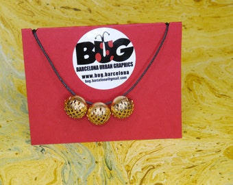 Necklace with gold buttons
