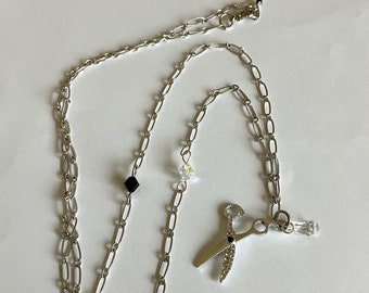 Long necklace, scissor pendant, crystal drop, black and transparent crystal spinning tops on silver stainless chain