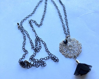 Long necklace with rosette and black silk pendant, crystal spinning top, transparent crystal drop and black stainless chain