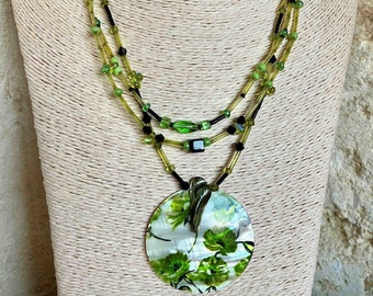 Necklace with painted natural mother-of-pearl round pendant