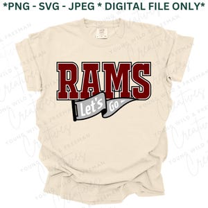 May include: A beige t-shirt with a red and grey graphic that says "RAMS" with a banner that says "Let's Go!"