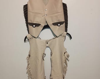 Handmade customizable leather children's vest and chaps set.
