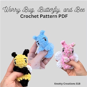 May include: The image displays three crocheted Worry Bug, Butterfly, and Bee patterns. The bee is yellow and black, the butterfly is pink and white, and the Worry Bug is blue. The text "Worry Bug, Butterfly, and Bee Crochet Pattern PDF" is at the top.