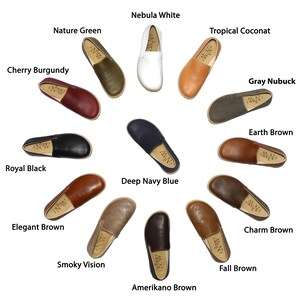 May include: A variety of 12 different colored slip-on shoes with a variety of color names, including Nebula White, Nature Green, Tropical Coconut, Cherry Burgundy, Royal Black, Deep Navy Blue, Elegant Brown, Gray Nubuck, Earth Brown, Charm Brown, Smoky Vision, Fall Brown, and Amerikano Brown.