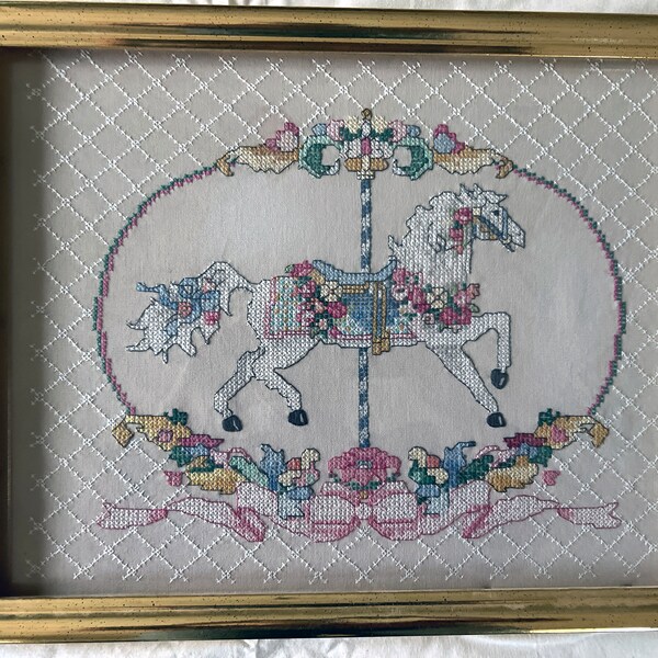 Beautiful Carousel Horse completed and framed needle point, cross stitch wall art. Gold plated frame is 17" x 14".