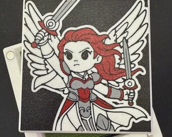 May include: Square sticker featuring a cartoon warrior with red hair, holding two swords. The warrior has white wings and wears red and gray armor. The background is black with a textured appearance. The sticker is on a white surface.