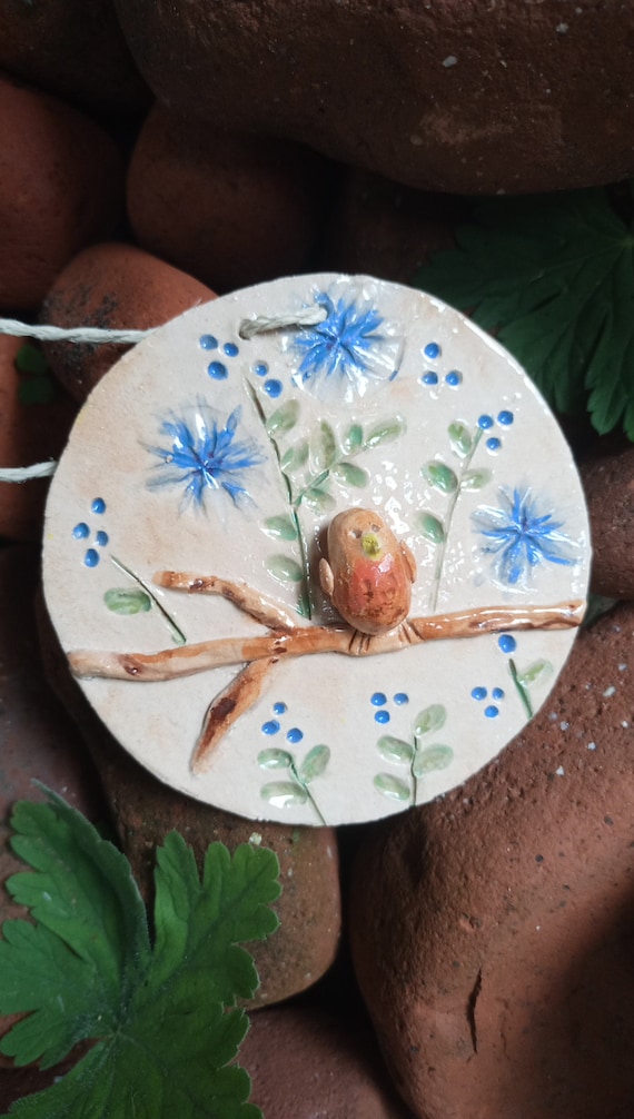 Pendant discus with bird made of ceramic handmade handcrafted clay nature country house