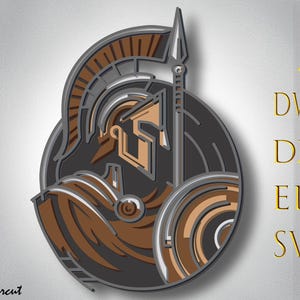 May include: A layered, three-dimensional design of a Spartan warrior in a helmet, holding a spear and shield. The design features shades of brown, gray, and tan. The image also includes the text "AI, DWG, DXF, EPS, SVG" and the name "Bylasercut".