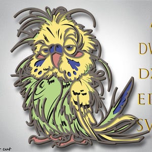 Może przedstawiać: Wielowarstwowa ilustracja śpiącej papużki w odcieniach żółci, zieleni, błękitu i brązu. Obraz zawiera tekst "AI, DWG, DXF, EPS, SVG" w złotych literach. Nazwa artysty, "Bylaser cut", znajduje się w lewym dolnym rogu.
