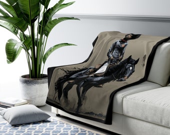 La manta polar Sherpa de la vaquera negra