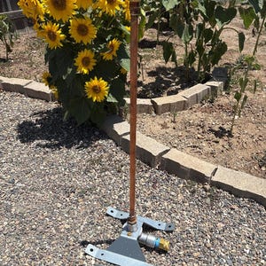 Heavy duty garden sled with 1960&#39;s Rain Bird spray head copper riser moves quick and simple