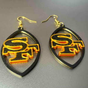 San Francisco 49ers (Rivalry Black and gold colors) fan football earrings