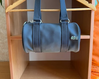 Lacoste Women's Navy Mini Small Сylindrical PVC Y2K Shoulder Handbag Vintage