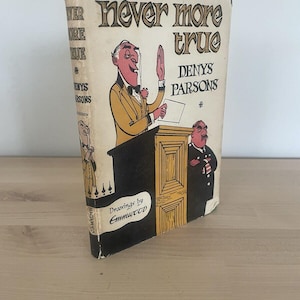 May include: A vintage book titled "Never More True" by Denys Parsons with illustrations by Emmwood. The cover features a cartoon illustration of a man in a yellow suit speaking at a podium with a policeman standing behind him.