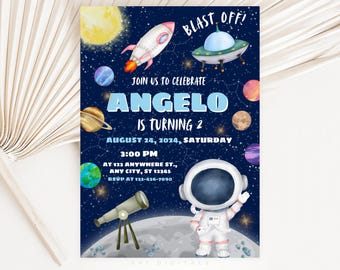 May include: A blue and white space-themed birthday invitation for a boy turning two. The invitation features a cartoon astronaut, a rocket ship, a UFO, planets, and a telescope. The text on the invitation reads "Blast Off! Join us to celebrate Angelo is turning 2 August 24, 2024, Saturday 3:00 PM at 123 Anywhere St., Any City, ST 12345 RSVP at 123-456-7890".