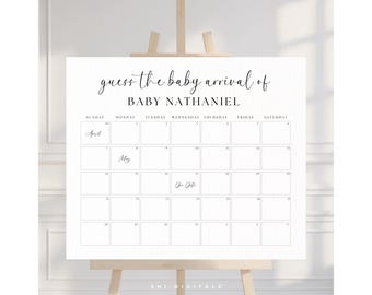 May include: A white calendar sign on a wooden easel, with the text "guess the baby arrival of BABY NATHANIEL." The calendar grid is labeled with days of the week and months, with some dates filled in. The sign is for a baby shower.