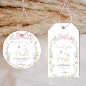 May include: Two white gift tags with a pink bow and floral border. The tags say "thank you" and feature a goose family with a balloon. The text reads "For celebrating this special day with us" and the name "Sharena's 1st Birthday" with the date.