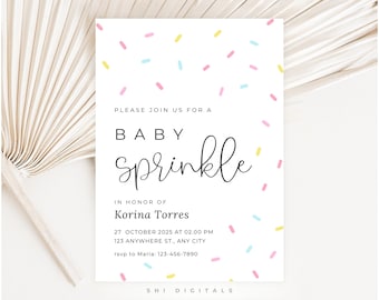 May include: A white baby sprinkle invitation with pastel confetti. The invitation text reads "Please join us for a Baby Sprinkle" with event details and RSVP information. The design includes a decorative palm leaf.