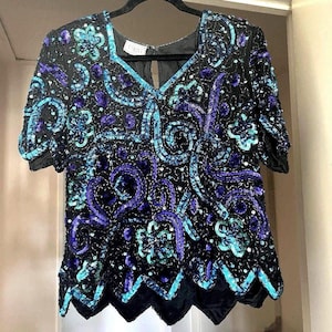 Vintage Laurence Kazar Carina top met lovertjes M jaren 80 bloemen V-hals geschulpte zoom