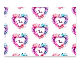 May include: A white background with a repeating pattern of watercolour hearts. Each heart is a different shade of pink, purple, and blue with the name "Olivia" written in purple inside each heart.
