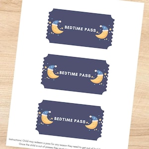 May include: Three blue and yellow bedtime passes with a crescent moon and stars. The passes have the text "BEDTIME PASS" printed on them.