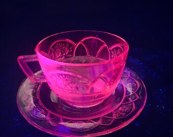 Pink selenium depression teacup and saucer set