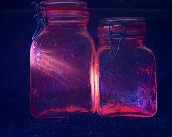 Set of 2 Pink selenium glass canister jars